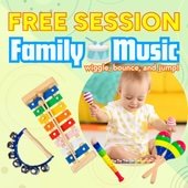 baby looking down with musical instruments around it