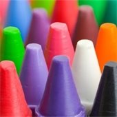 a close up on the tops of crayons of various colors