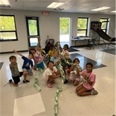 Kids smiling with paper chain