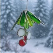 photo of glass art held by a hand