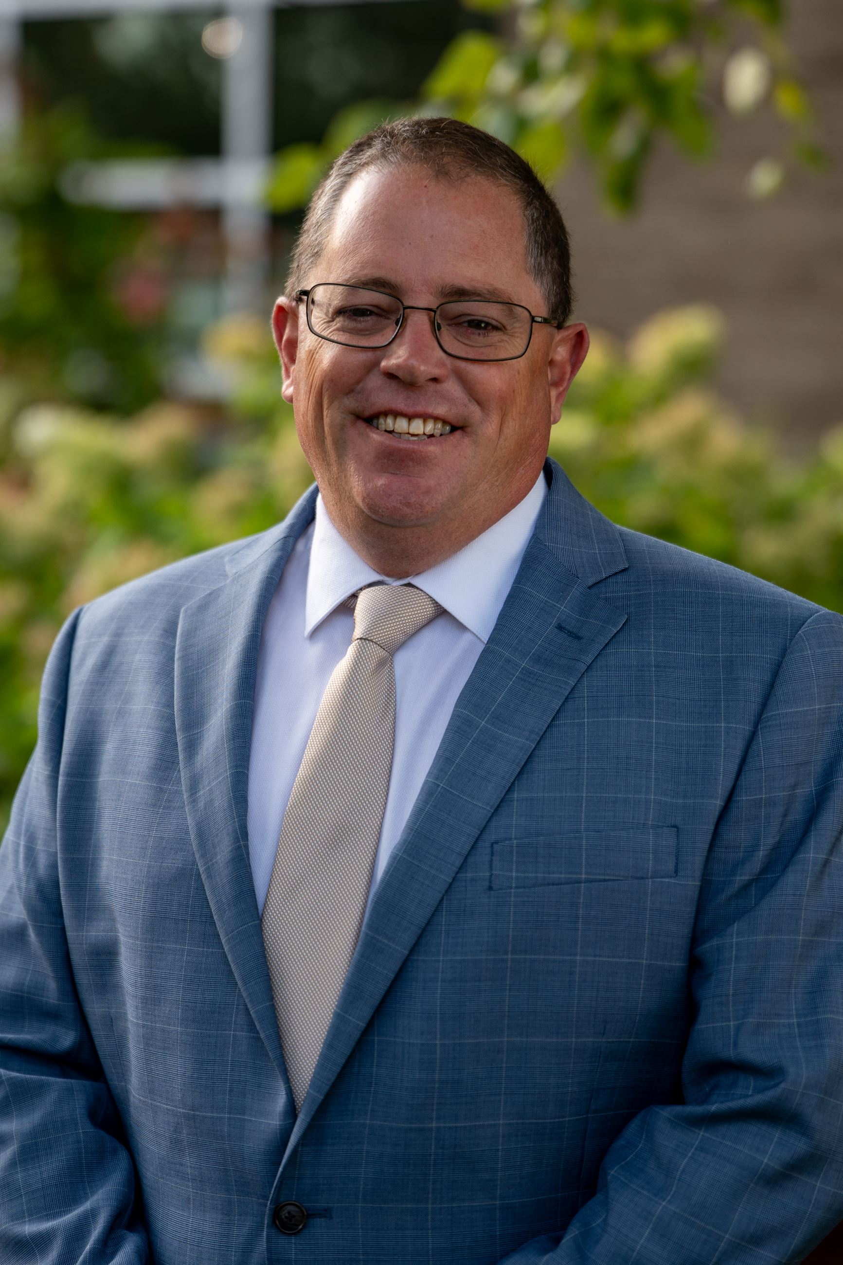 man in suit with tie from chest up